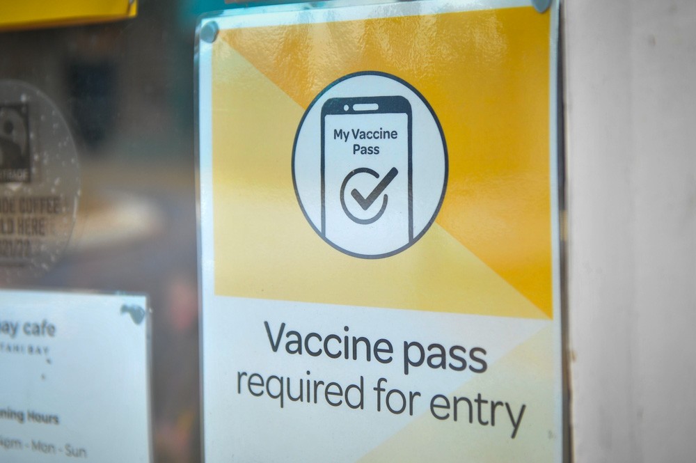 COVID vaccine pass sign