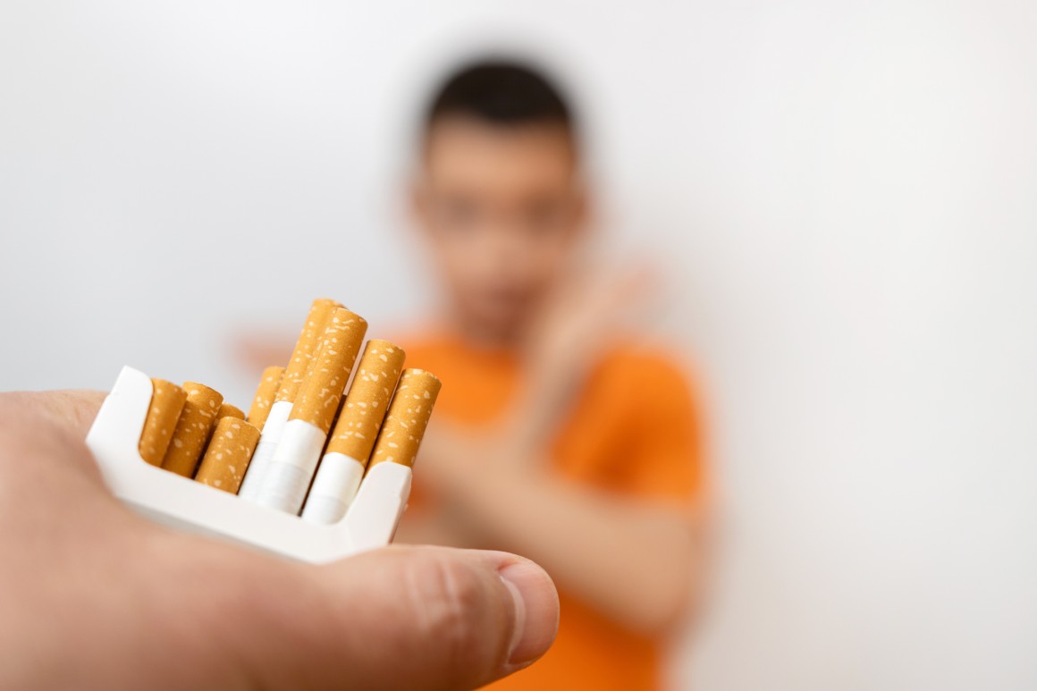 Child crossing arms - no to tobacco