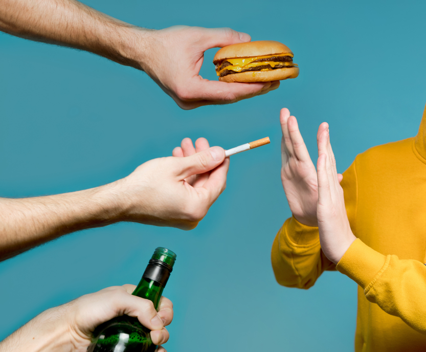 on offer from hands - cigarettes, alcohol, junkfood