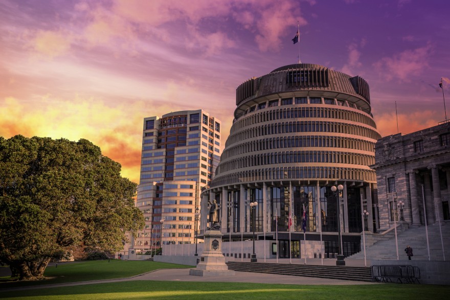 Image of Beehive and parliament buildings at sunset