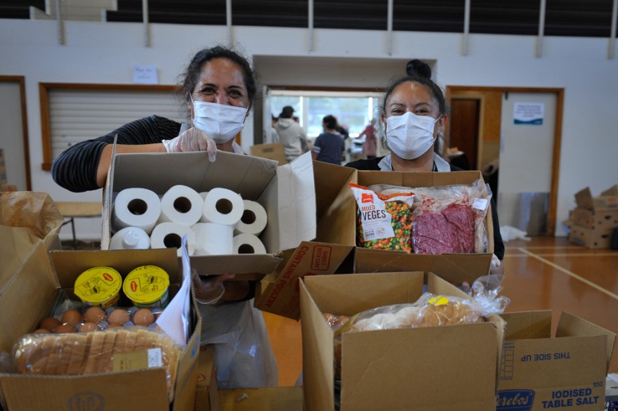 Workers at Kōkiri Marae preparing food 