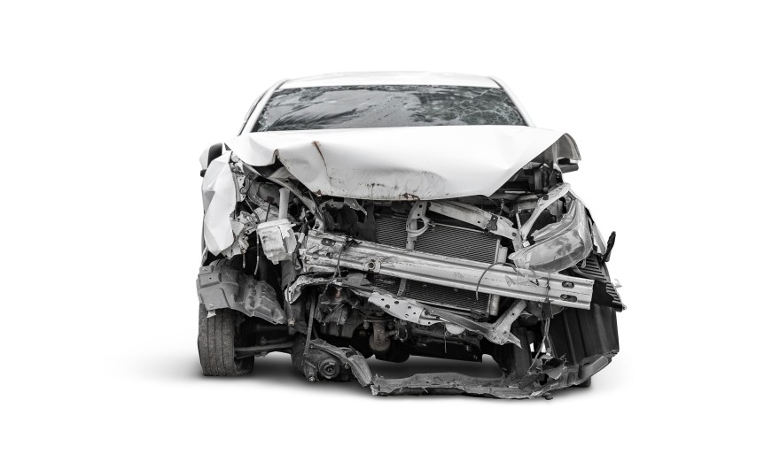 Crashed car on white background