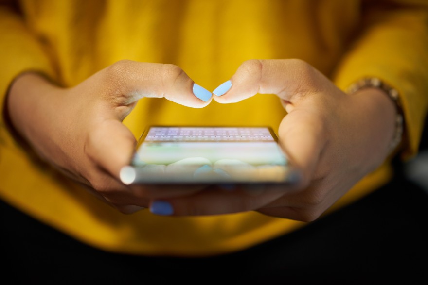 young person on phone