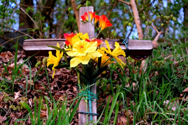 wooden cross with flowers