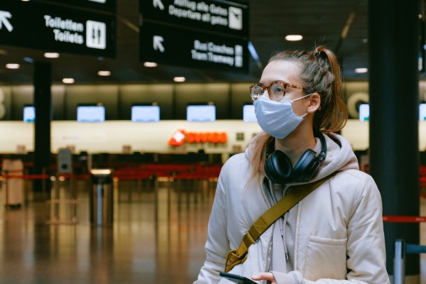 woman in mask at airport