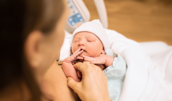 Mother holding newborn baby