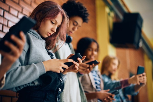 Group of young people on phones
